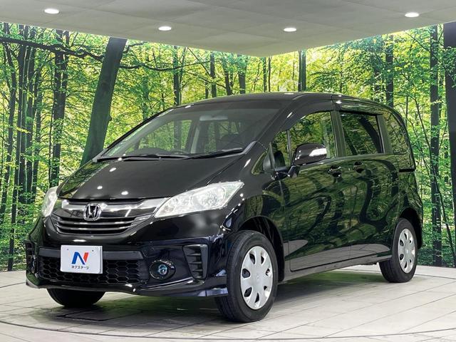 フリード Ｇ　プレミアムエディション　４ＷＤ　純正９型ナビ　後席モニター　両側パワースライドドア　バックカメラ　クルーズコントロール　ＥＴＣ　ＣＤ／ＤＶＤ／フルセグ　ＨＩＤランプ　フロントフォグ　オートライト　オートエアコン　スマートキー（48枚目）