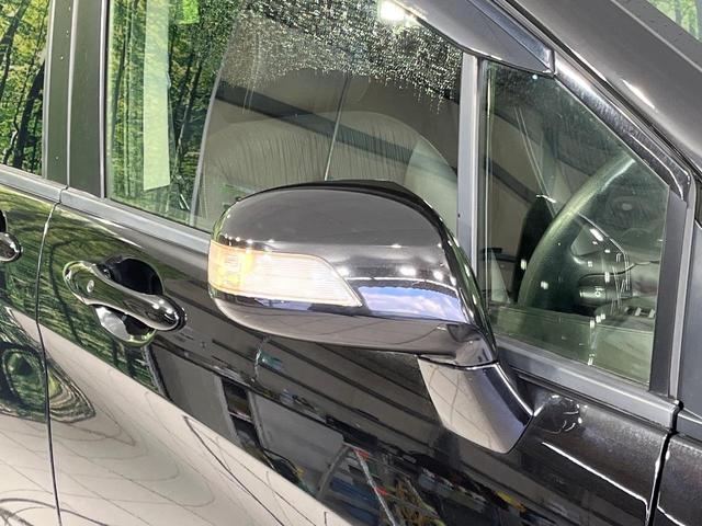 フリード Ｇ　プレミアムエディション　４ＷＤ　純正９型ナビ　後席モニター　両側パワースライドドア　バックカメラ　クルーズコントロール　ＥＴＣ　ＣＤ／ＤＶＤ／フルセグ　ＨＩＤランプ　フロントフォグ　オートライト　オートエアコン　スマートキー（52枚目）