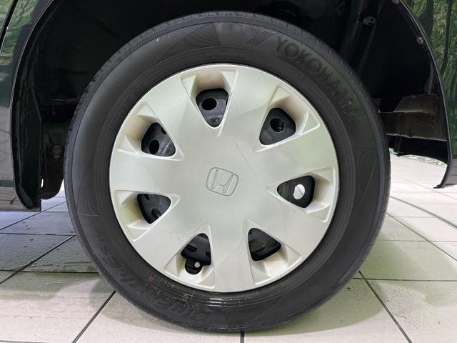 フリード Ｇ　プレミアムエディション　４ＷＤ　純正９型ナビ　後席モニター　両側パワースライドドア　バックカメラ　クルーズコントロール　ＥＴＣ　ＣＤ／ＤＶＤ／フルセグ　ＨＩＤランプ　フロントフォグ　オートライト　オートエアコン　スマートキー（53枚目）