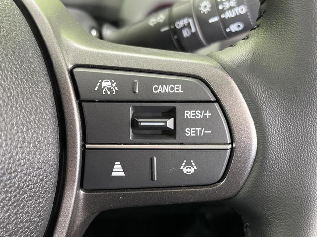 フリード e:HEVクロスター 4WD 登録済未使用車 両側パワースライドドア ホンダセンシング アダプティブクルコン ブラインドスポットモニター 前席シートヒーター オートブレーキホールド LEDランプ LEDフォグ スマートキー(5枚目)