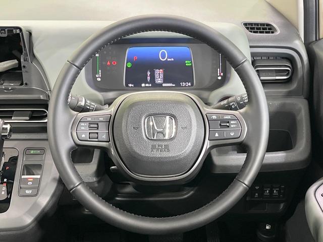 フリード e:HEVクロスター 4WD 登録済未使用車 両側パワースライドドア ホンダセンシング アダプティブクルコン ブラインドスポットモニター 前席シートヒーター オートブレーキホールド LEDランプ LEDフォグ スマートキー(12枚目)