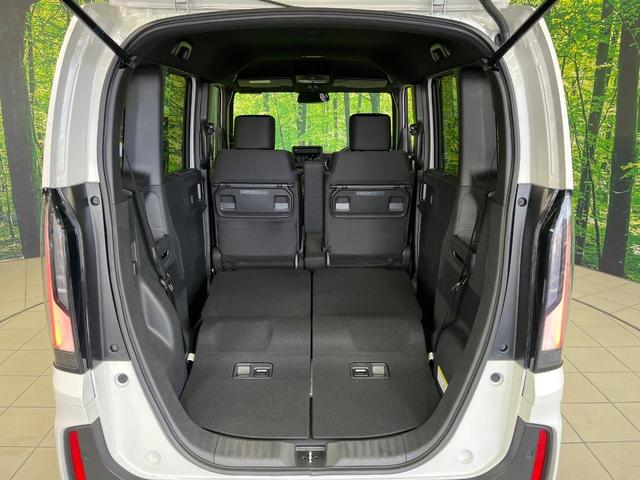 Ｎ－ＢＯＸカスタム ベースグレード　届出済未使用車　両側パワースライドドア　ホンダセンシング　アダプティブクルコン　前席シートヒーター　ＬＥＤランプ　オートライト　オートエアコン　スマートキー　ロールサンシェード　シートバックテーブル（11枚目）