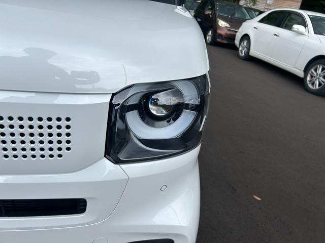 N-BOX 届出済未使用車 4WD 横滑り防止 LEDライト スマ-トキ- アイドリングストップ クルーズコントロール オートエアコン USB 両側スライド片側電動ドア シートヒーター プッシュスタート(5枚目)