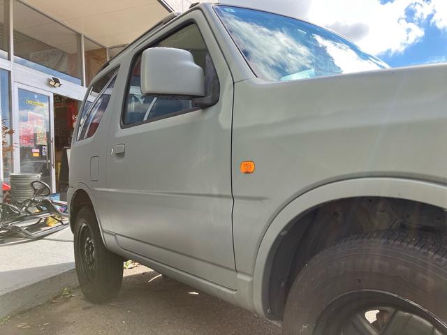 ジムニー ランドベンチャー キーレスエントリー 4WD ETC CD アルミホイール 革シート シートヒーター 運転席・助手席エアバック ABS 衝突安全ボディ エアコン パワーウインドウ(11枚目)