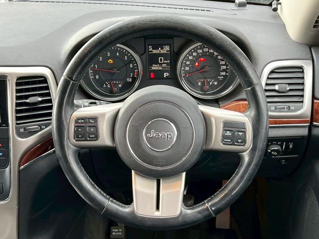 ジープ・グランドチェロキー リミテッド 純正アルミ履替/ナビ/フルセグTV/Bluetooth/クルーズコントロール/キーレスエントリー/シートヒーター/オートライト(24枚目)