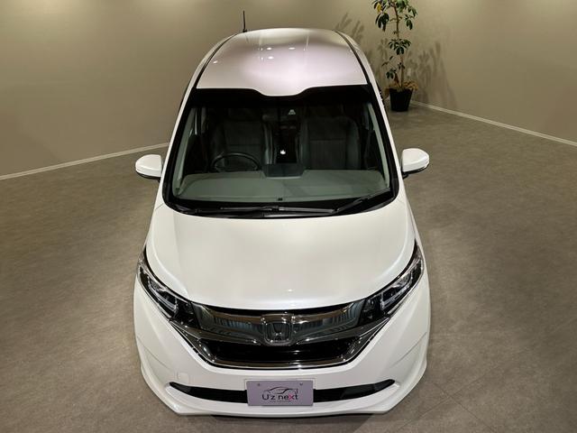 フリードハイブリッド ハイブリッド・Ｇホンダセンシング　６人乗り　両側パワスラドア　Ｓパッケージ／本革ステアリング／ハーフレザーコンビシート／純正１５インチアルミ　純正ナビ／ＴＶ／ＤＶＤ／ＣＤ／Ｂｌｕｅｔｏｏｔｈ　後席モニター　バックモニター　ＥＴＣ（11枚目）