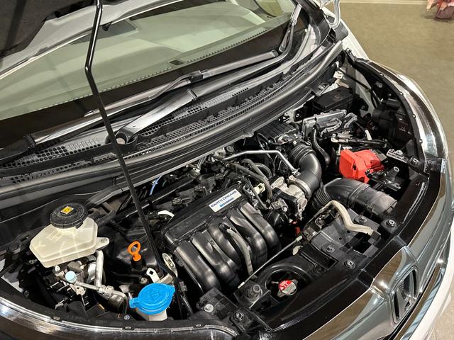 フリードハイブリッド ハイブリッド・Ｇホンダセンシング　６人乗り　両側パワスラドア　Ｓパッケージ／本革ステアリング／ハーフレザーコンビシート／純正１５インチアルミ　純正ナビ／ＴＶ／ＤＶＤ／ＣＤ／Ｂｌｕｅｔｏｏｔｈ　後席モニター　バックモニター　ＥＴＣ（28枚目）