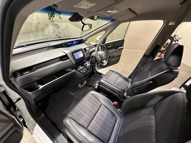 フリードハイブリッド ハイブリッド・Ｇホンダセンシング　６人乗り　両側パワスラドア　Ｓパッケージ／本革ステアリング／ハーフレザーコンビシート／純正１５インチアルミ　純正ナビ／ＴＶ／ＤＶＤ／ＣＤ／Ｂｌｕｅｔｏｏｔｈ　後席モニター　バックモニター　ＥＴＣ（37枚目）