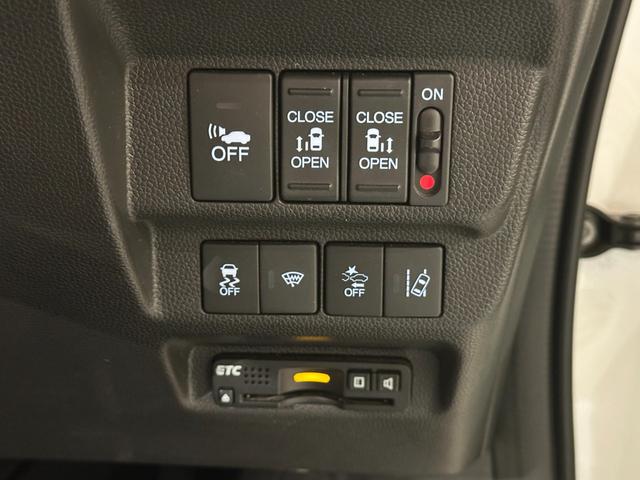 フリードハイブリッド ハイブリッド・Ｇホンダセンシング　６人乗り　両側パワスラドア　Ｓパッケージ／本革ステアリング／ハーフレザーコンビシート／純正１５インチアルミ　純正ナビ／ＴＶ／ＤＶＤ／ＣＤ／Ｂｌｕｅｔｏｏｔｈ　後席モニター　バックモニター　ＥＴＣ（62枚目）