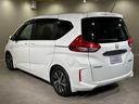 ハイブリッド・Ｇホンダセンシング　６人乗り　両側パワスラドア　Ｓパッケージ／本革ステアリング／ハーフレザーコンビシート／純正１５インチアルミ　純正ナビ／ＴＶ／ＤＶＤ／ＣＤ／Ｂｌｕｅｔｏｏｔｈ　後席モニター　バックモニター　ＥＴＣ（23枚目）