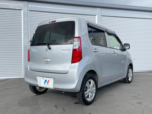 ワゴンR FX-E CDオーディオ 禁煙車 キーレスエントリー ヘッドライトレベライザー オートエアコン パワウィンドー(13枚目)