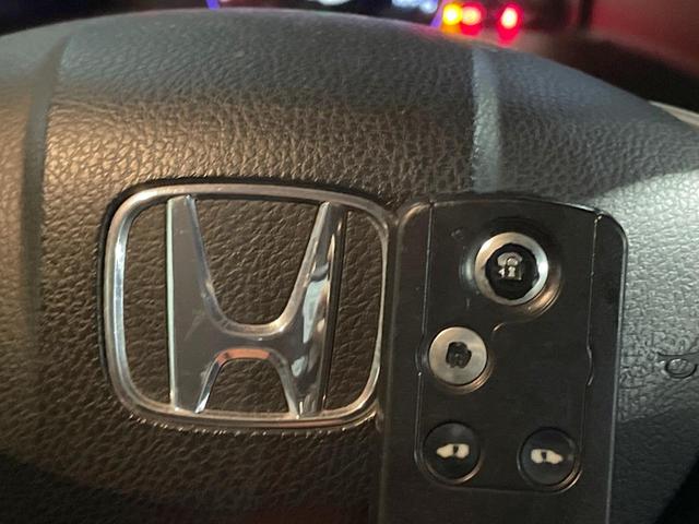 ステップワゴンスパーダ Z クールスピリット 両側電動ドア 禁煙車 ハーフレザーシート スマートキー HIDヘッド ETC クルコン 純正17インチアルミ オートライト オートエアコン CD DVD再生 フルセグ(33枚目)