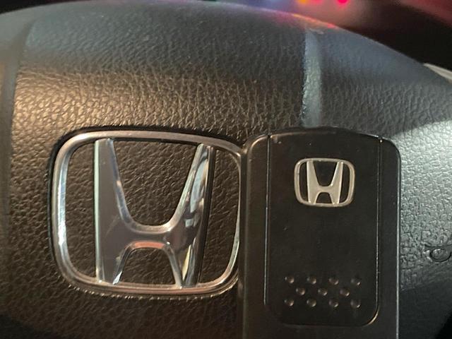 ステップワゴンスパーダ Z クールスピリット 両側電動ドア 禁煙車 ハーフレザーシート スマートキー HIDヘッド ETC クルコン 純正17インチアルミ オートライト オートエアコン CD DVD再生 フルセグ(34枚目)