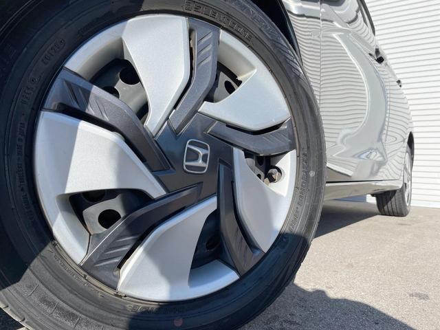 フィットハイブリッド Fパッケージ 禁煙車 純正ナビ スマートキー ETC オートエアコン Bluetooth 横滑り防止装置 電動格納ミラー CD・DVD再生(13枚目)