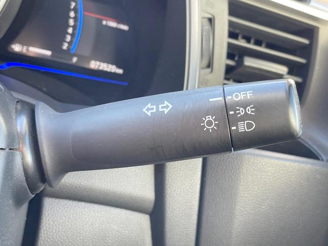 フィットハイブリッド Fパッケージ 禁煙車 純正ナビ スマートキー ETC オートエアコン Bluetooth 横滑り防止装置 電動格納ミラー CD・DVD再生(27枚目)