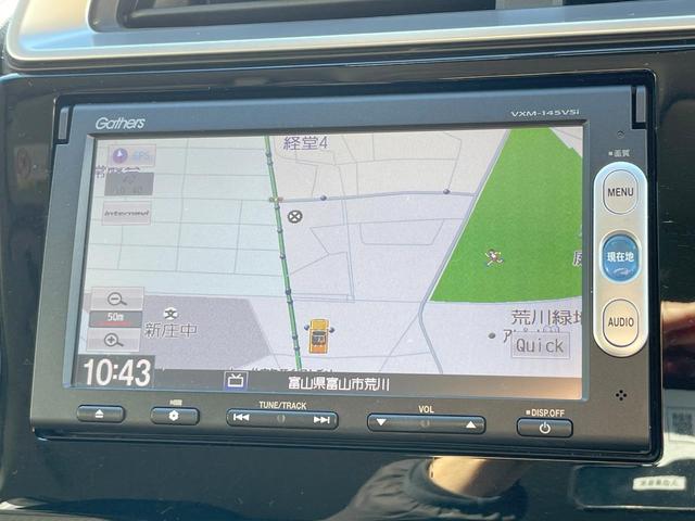 フィットハイブリッド Fパッケージ 禁煙車 純正ナビ スマートキー ETC オートエアコン Bluetooth 横滑り防止装置 電動格納ミラー CD・DVD再生(28枚目)