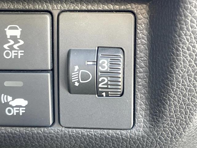 フィットハイブリッド Fパッケージ 禁煙車 純正ナビ スマートキー ETC オートエアコン Bluetooth 横滑り防止装置 電動格納ミラー CD・DVD再生(30枚目)