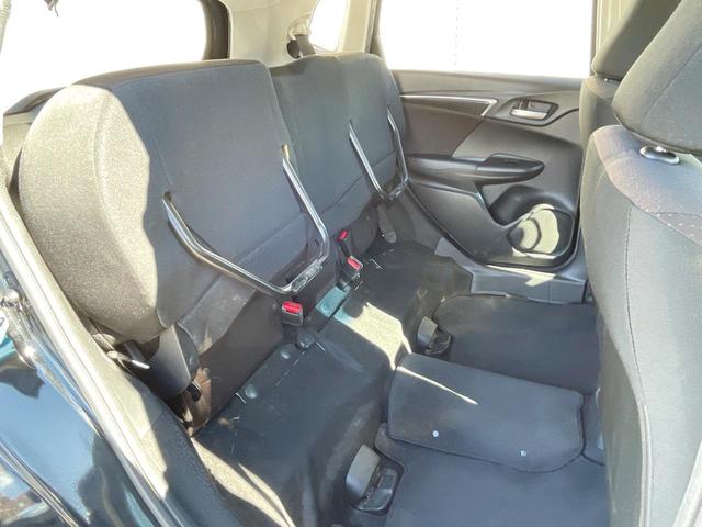 フィットハイブリッド Fパッケージ 禁煙車 純正ナビ スマートキー ETC オートエアコン Bluetooth 横滑り防止装置 電動格納ミラー CD・DVD再生(35枚目)