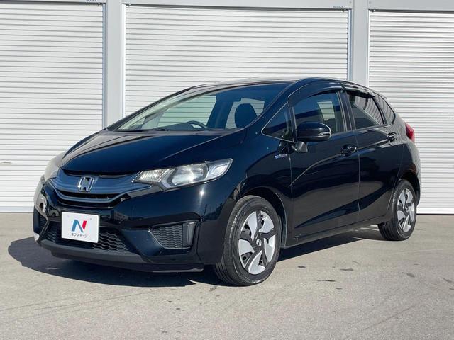 フィットハイブリッド Fパッケージ 禁煙車 純正ナビ スマートキー ETC オートエアコン Bluetooth 横滑り防止装置 電動格納ミラー CD・DVD再生(41枚目)