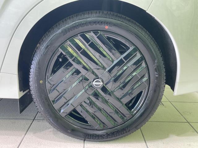 オーラ G FOUR 90周年記念車 4WD 純正9型ナビ 全周囲カメラ BOSE エマージェンシーブレーキ プロパイロット 禁煙車 本革シート シートヒーター パワーシート コーナーセンサー スマートキー LEDヘッド ETC(28枚目)