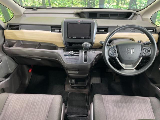 フリード G・ホンダセンシング 後席モニター 禁煙車 両側電動ドア SDナビ バックカメラ 衝突被害軽減システム アダプティブクルーズ ETC 車線逸脱警報 Bluetooth(2枚目)