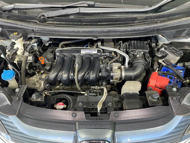 フリード G・ホンダセンシング 後席モニター 禁煙車 両側電動ドア SDナビ バックカメラ 衝突被害軽減システム アダプティブクルーズ ETC 車線逸脱警報 Bluetooth(18枚目)