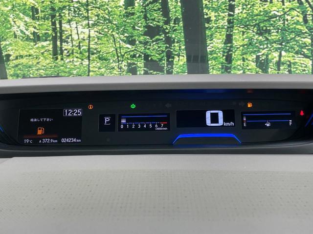 フリード G・ホンダセンシング 後席モニター 禁煙車 両側電動ドア SDナビ バックカメラ 衝突被害軽減システム アダプティブクルーズ ETC 車線逸脱警報 Bluetooth(25枚目)