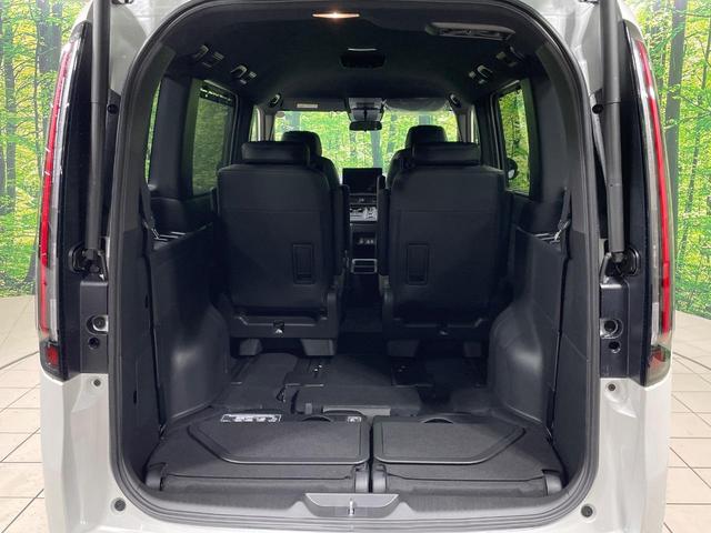 ステップワゴン ｅ：ＨＥＶスパーダ　両側電動ドア　純正１１型ナビ　バックカメラ　衝突被害軽減システム　Ｂｌｕｅｔｏｏｔｈ接続　レーダークルーズ　電動リアゲート　ハーフレザーシート　コーナーセンサー　スマートキー　ＬＥＤヘッド（12枚目）