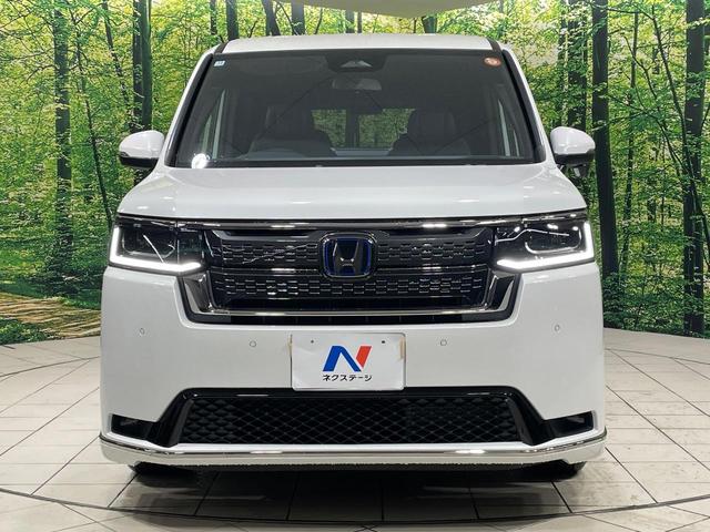 ステップワゴン ｅ：ＨＥＶスパーダ　両側電動ドア　純正１１型ナビ　バックカメラ　衝突被害軽減システム　Ｂｌｕｅｔｏｏｔｈ接続　レーダークルーズ　電動リアゲート　ハーフレザーシート　コーナーセンサー　スマートキー　ＬＥＤヘッド（16枚目）