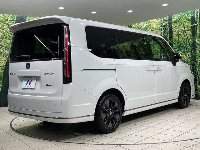 ステップワゴン ｅ：ＨＥＶスパーダ　両側電動ドア　純正１１型ナビ　バックカメラ　衝突被害軽減システム　Ｂｌｕｅｔｏｏｔｈ接続　レーダークルーズ　電動リアゲート　ハーフレザーシート　コーナーセンサー　スマートキー　ＬＥＤヘッド（24枚目）