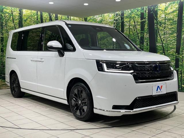 ステップワゴン ｅ：ＨＥＶスパーダ　両側電動ドア　純正１１型ナビ　バックカメラ　衝突被害軽減システム　Ｂｌｕｅｔｏｏｔｈ接続　レーダークルーズ　電動リアゲート　ハーフレザーシート　コーナーセンサー　スマートキー　ＬＥＤヘッド（25枚目）