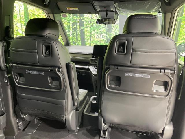 ステップワゴン ｅ：ＨＥＶスパーダ　両側電動ドア　純正１１型ナビ　バックカメラ　衝突被害軽減システム　Ｂｌｕｅｔｏｏｔｈ接続　レーダークルーズ　電動リアゲート　ハーフレザーシート　コーナーセンサー　スマートキー　ＬＥＤヘッド（56枚目）