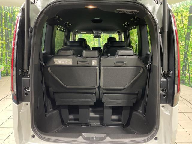 ステップワゴン ｅ：ＨＥＶスパーダ　両側電動ドア　純正１１型ナビ　バックカメラ　衝突被害軽減システム　Ｂｌｕｅｔｏｏｔｈ接続　レーダークルーズ　電動リアゲート　ハーフレザーシート　コーナーセンサー　スマートキー　ＬＥＤヘッド（64枚目）