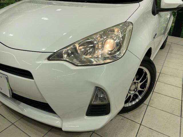 アクア Ｇブラックソフトレザーセレクション　純正ＨＤＤナビ　バックカメラ　禁煙車　ハーフレザーシート　スマートキー　ビルトインＥＴＣ　オートライト　オートエアコン　Ｂｌｕｅｔｏｏｔｈ　ＣＤ　ＤＶＤ再生（12枚目）