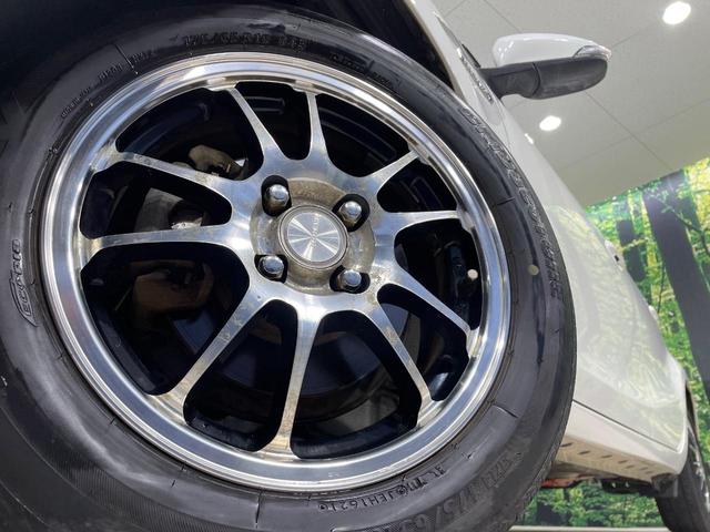 アクア Ｇブラックソフトレザーセレクション　純正ＨＤＤナビ　バックカメラ　禁煙車　ハーフレザーシート　スマートキー　ビルトインＥＴＣ　オートライト　オートエアコン　Ｂｌｕｅｔｏｏｔｈ　ＣＤ　ＤＶＤ再生（13枚目）