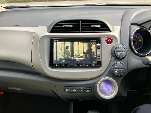 フィットハイブリッド スマートセレクション ファインスタイル スマートキー ナビ USB接続 ミュージックプレイヤー接続 CD DVD再生 TV シートヒーター HIDヘッドライト 運転席・助手席エアバッグ ABS 衝突安全ボディ エアコン パワーステアリング(41枚目)