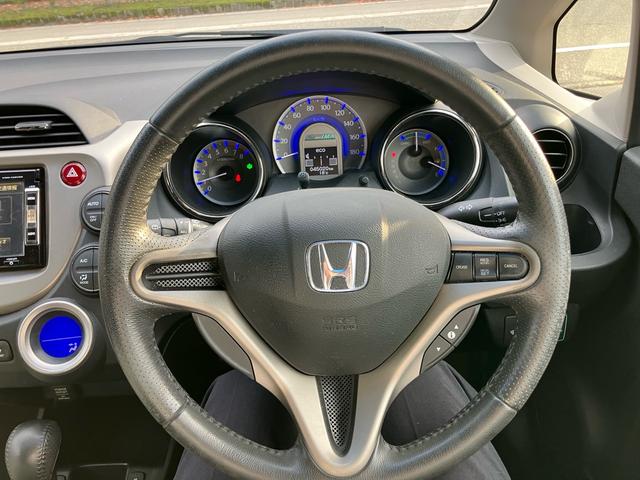 フィットハイブリッド スマートセレクション ファインスタイル スマートキー ナビ USB接続 ミュージックプレイヤー接続 CD DVD再生 TV シートヒーター HIDヘッドライト 運転席・助手席エアバッグ ABS 衝突安全ボディ エアコン パワーステアリング(47枚目)