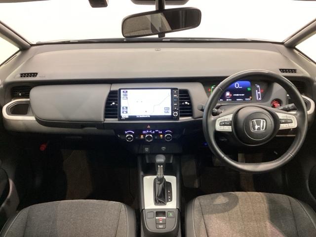 フィット e:HEVホーム H SENSING 新車保証 試乗車 ワンオ-ナ- ナビVXU-245FTi TV Rカメラ CD録音 BTオ-ディオ DVD ドラレコ ETC LEDライト VSA クルコン スマ-トキ- 1オナ(9枚目)