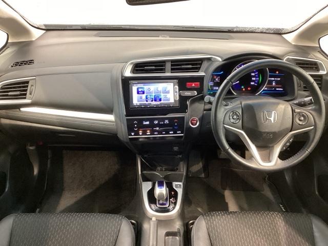 フィットハイブリッド Lパッケージ 1年保証 ナビVXM-155VSi TV Rカメラ BTオ-ディオ DVD ETC LEDライト VSA クルコン スマ-トキ- 盗難防止装置 整備記録簿 AAC スペアキ- Wエアバッグ ESC(7枚目)
