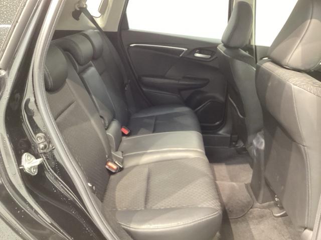 フィットハイブリッド Lパッケージ 1年保証 ナビVXM-155VSi TV Rカメラ BTオ-ディオ DVD ETC LEDライト VSA クルコン スマ-トキ- 盗難防止装置 整備記録簿 AAC スペアキ- Wエアバッグ ESC(19枚目)