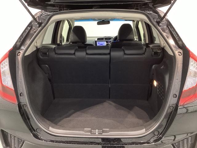 フィットハイブリッド Lパッケージ 1年保証 ナビVXM-155VSi TV Rカメラ BTオ-ディオ DVD ETC LEDライト VSA クルコン スマ-トキ- 盗難防止装置 整備記録簿 AAC スペアキ- Wエアバッグ ESC(33枚目)