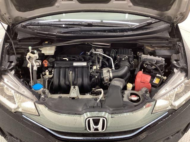 フィットハイブリッド Lパッケージ 1年保証 ナビVXM-155VSi TV Rカメラ BTオ-ディオ DVD ETC LEDライト VSA クルコン スマ-トキ- 盗難防止装置 整備記録簿 AAC スペアキ- Wエアバッグ ESC(40枚目)