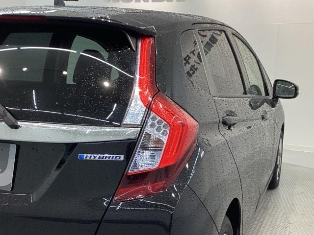 フィットハイブリッド Lパッケージ 1年保証 ナビVXM-155VSi TV Rカメラ BTオ-ディオ DVD ETC LEDライト VSA クルコン スマ-トキ- 盗難防止装置 整備記録簿 AAC スペアキ- Wエアバッグ ESC(41枚目)