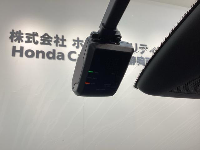 フィット ホーム H SENSING 新車保証 試乗車 ワンオ-ナ- ナビVXU-245FTi TV Rカメラ CD録音 BTオ-ディオ DVD ドラレコ ETC LEDライト VSA クルコン スマ-トキ- AAC(12枚目)