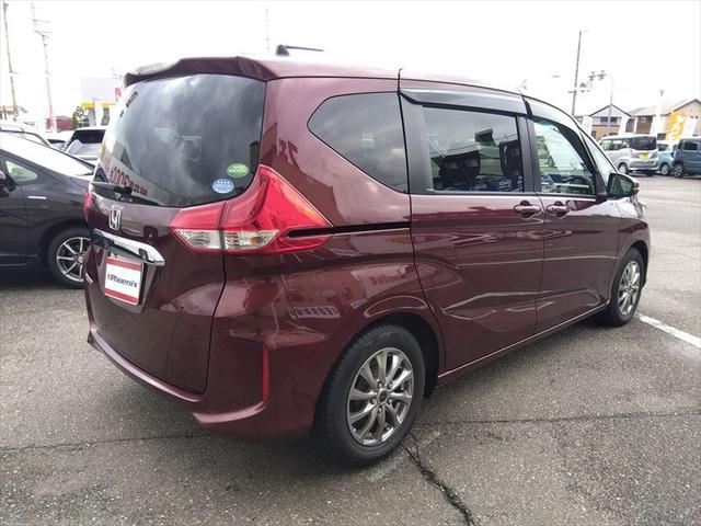 フリード Ｇ・ホンダセンシング☆禁煙車☆走行５．６万ｋｍ☆ナビ☆ＴＶ☆　純正ナビ☆ＴＶ☆Ｂｌｕｅｔｏｏｔｈ☆ビルトインＥＴＣ☆バックカメラ☆両側パワースライドドア☆ホンダセンシング☆アダプティブクルーズコントロール☆ヒーテッドドアミラー☆横滑り防止☆スマートキー☆試乗ＯＫ（4枚目）