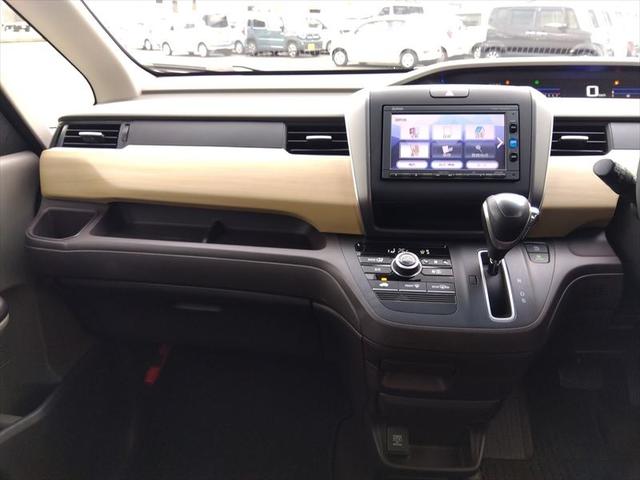 フリード Ｇ・ホンダセンシング☆禁煙車☆走行５．６万ｋｍ☆ナビ☆ＴＶ☆　純正ナビ☆ＴＶ☆Ｂｌｕｅｔｏｏｔｈ☆ビルトインＥＴＣ☆バックカメラ☆両側パワースライドドア☆ホンダセンシング☆アダプティブクルーズコントロール☆ヒーテッドドアミラー☆横滑り防止☆スマートキー☆試乗ＯＫ（5枚目）