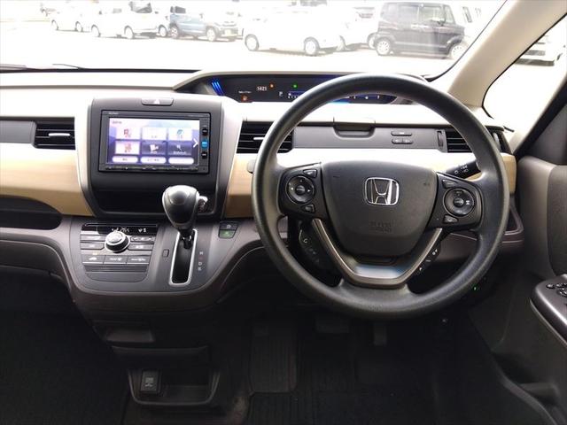 フリード Ｇ・ホンダセンシング☆禁煙車☆走行５．６万ｋｍ☆ナビ☆ＴＶ☆　純正ナビ☆ＴＶ☆Ｂｌｕｅｔｏｏｔｈ☆ビルトインＥＴＣ☆バックカメラ☆両側パワースライドドア☆ホンダセンシング☆アダプティブクルーズコントロール☆ヒーテッドドアミラー☆横滑り防止☆スマートキー☆試乗ＯＫ（12枚目）