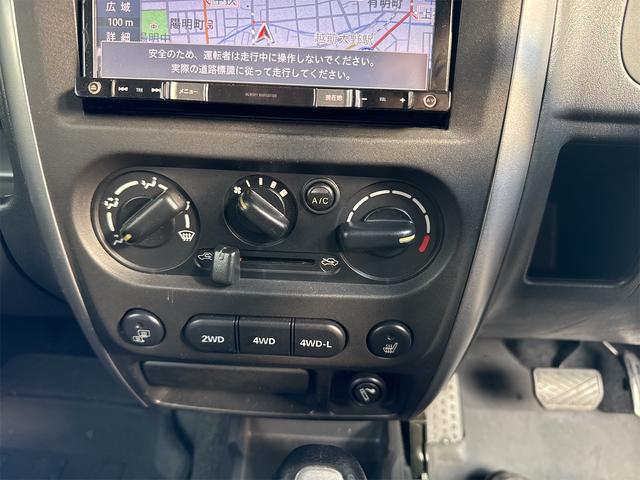 ジムニー ワイルドウインド 4WD ETC ナビ TV キーレスエントリー 電動格納ミラー シートヒーター AT ABS ルーフレール アルミホイール 衝突安全ボディ エアコン パワーウィンドウ(4枚目)