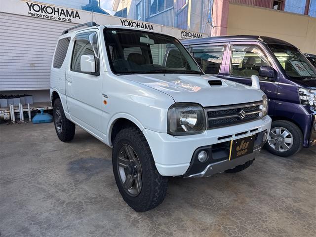 ジムニー ワイルドウインド 4WD ETC ナビ TV キーレスエントリー 電動格納ミラー シートヒーター AT ABS ルーフレール アルミホイール 衝突安全ボディ エアコン パワーウィンドウ(14枚目)