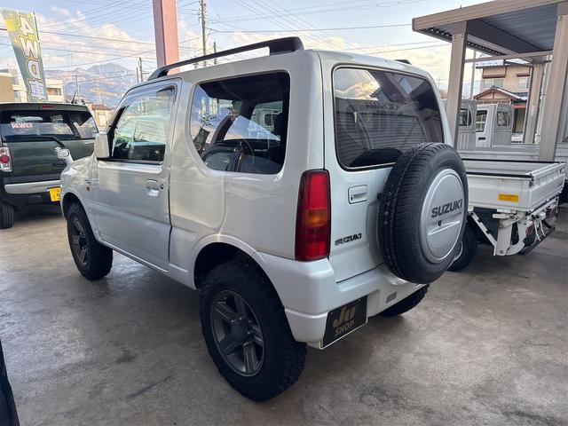 ジムニー ワイルドウインド 4WD ETC ナビ TV キーレスエントリー 電動格納ミラー シートヒーター AT ABS ルーフレール アルミホイール 衝突安全ボディ エアコン パワーウィンドウ(15枚目)